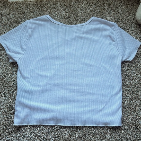YMI collections, white T shirt. Size small made with Polyester. - Picture 3 of 3